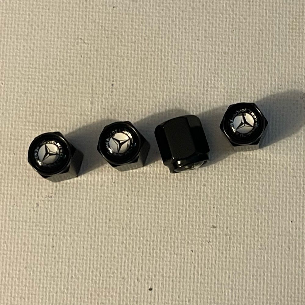 Mercedes Benz Logo valve Stem caps in black set of 4 NWT